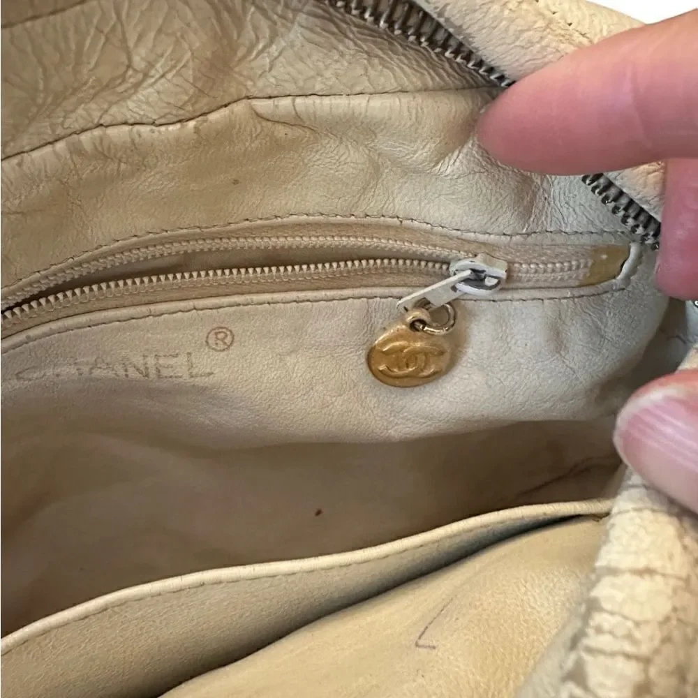 Chanel beige quilted gold tone leather crossbody bag